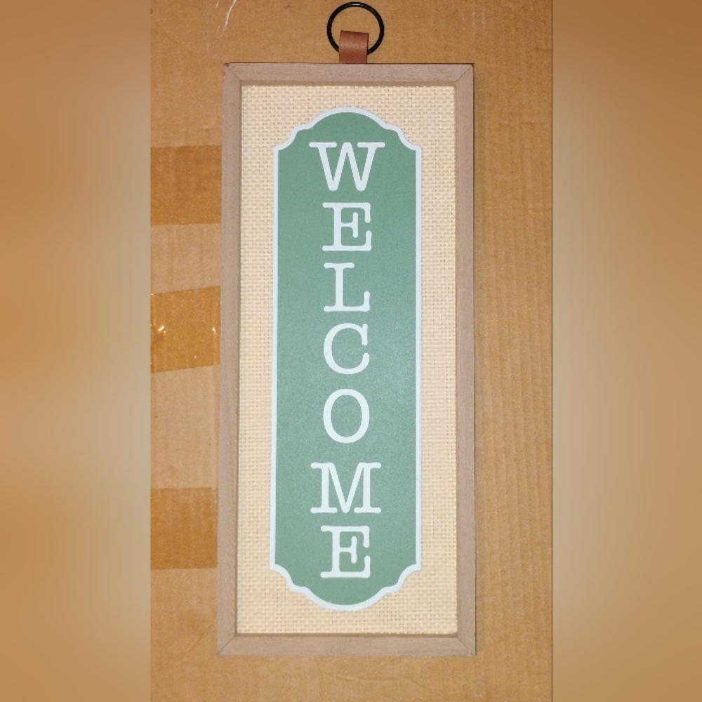 Green Welcome Sign